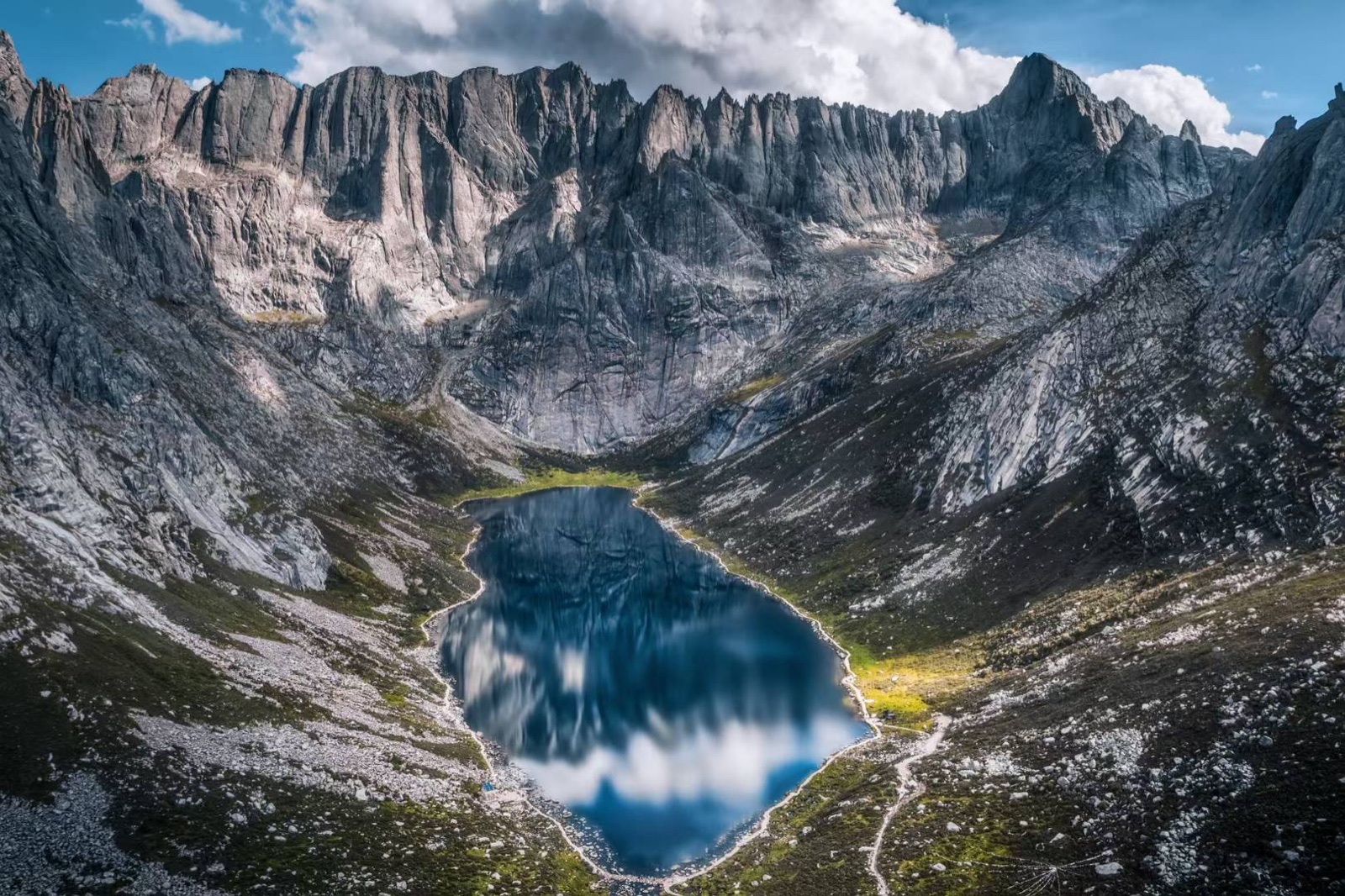 Alpine lake and jagged ridgeline